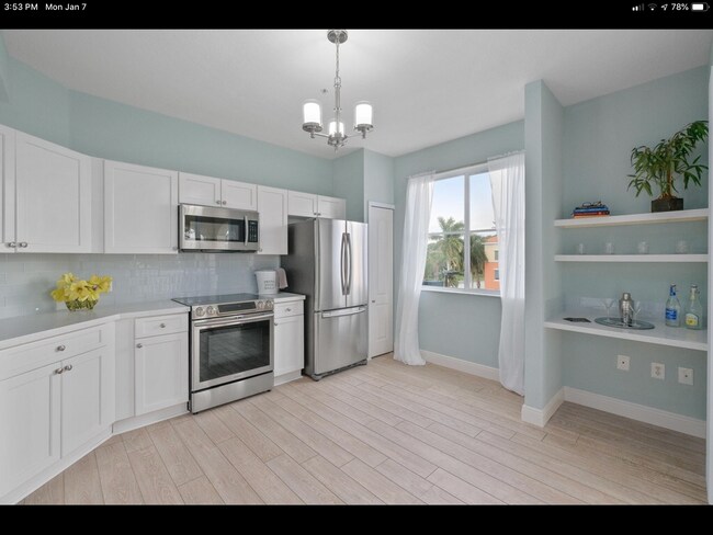 Kitchen with bar area and lots of light