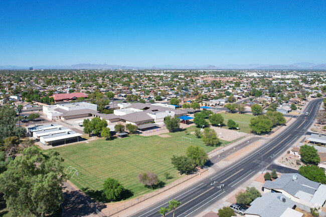Sirrine Montessori campus includes a soccer field and basketball courts.
