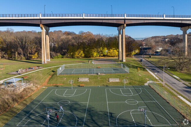 Kids enjoying the basket ball courts at Elizabeth Park in Elizabeth Park Valley.