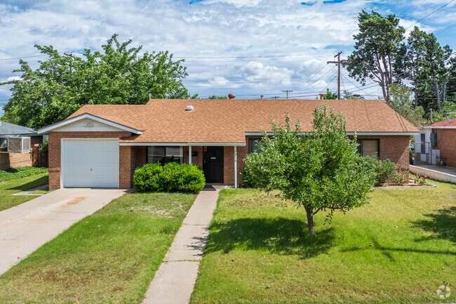 Some homes in Inez feature grass lawns.