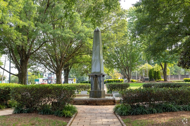 The Roswell Town Square was built in 1839 and the center fountain honors the founding families.