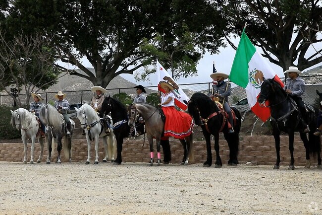 Mexican Community Caballeros posing on Parade Day in Norco, Horse Town USA.