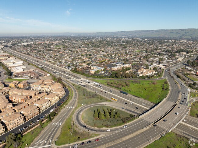 The Glenmoor neighborhood entrance beckons off Highway 880 with its inviting charm.