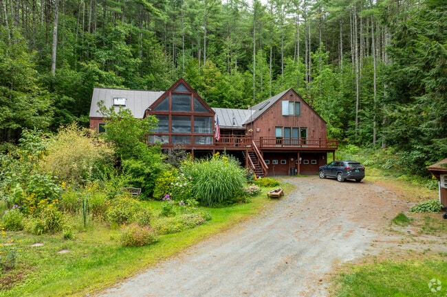 Cabin-style homes are common in the wooded areas of Hartford.