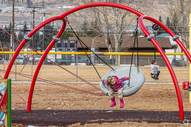 Children love the swings and zipline at Stodden Park in Butte, Montana.