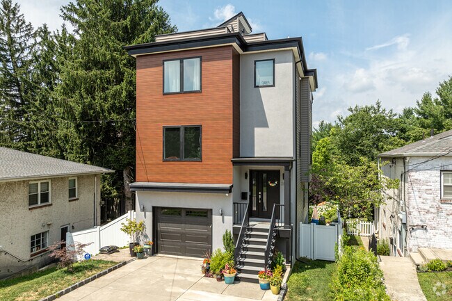Newer, contemporary homes can be found mixed in with older Upper Roxborough homes.