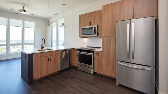 Kitchen with Stainless Steel Appliances and Hard Surface Flooring