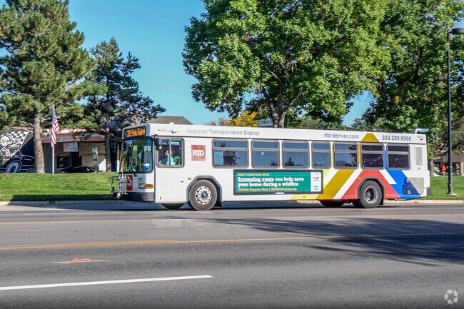 Regional Transportation District (RTD) bus runs along 28th Street in Palo Park.