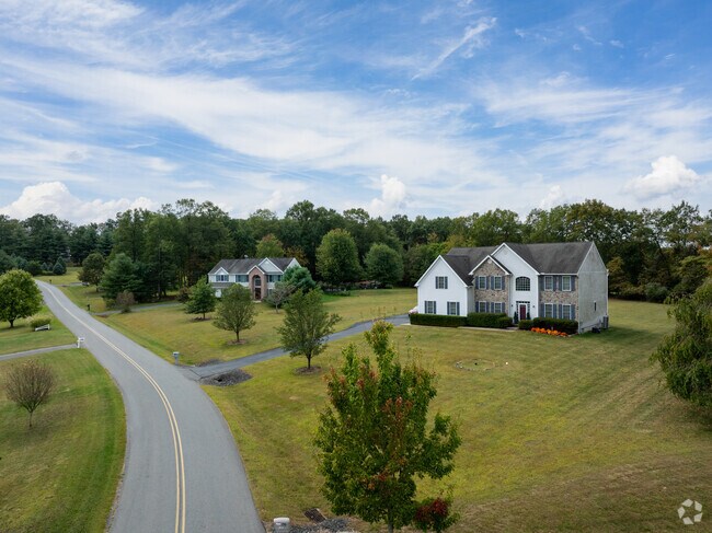 Tree-lined streets in South Manheim feature custom homes on generous parcels, offering both privacy and space.