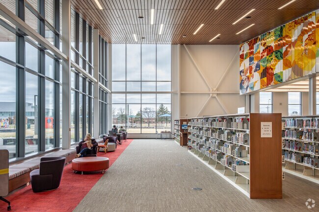 College Park residents enjoy picking up a new book at the Brooklyn Park Public Library.