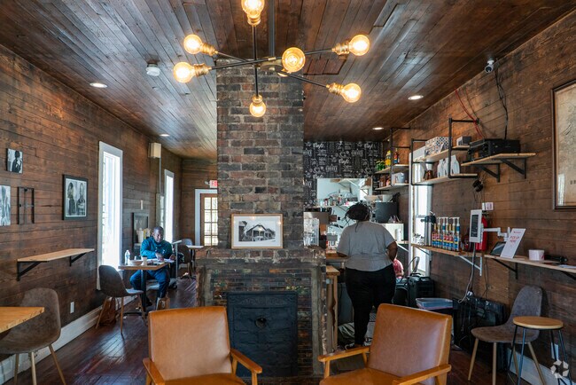 Enjoy a cup of coffee with a friend at Modern Coffee House in Titusville.