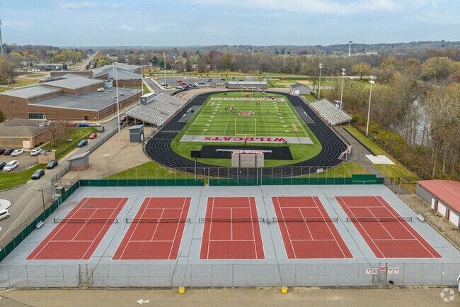 Canton South High School offers a variety of sports programs, including tennis and football.
