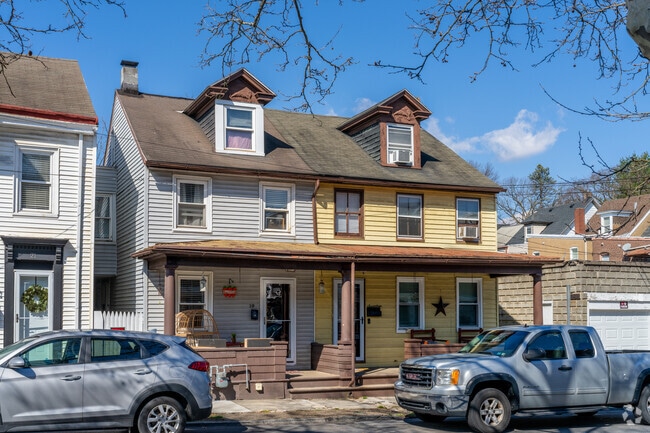 Twin homes in West Ward offer comfortable front porches and nicely-sized interiors.