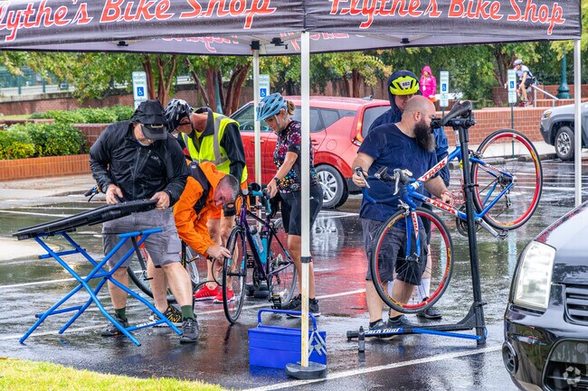 Mechanics prepare bikes for Cherry Branch cyclists participating in the BikeMS charity ride.