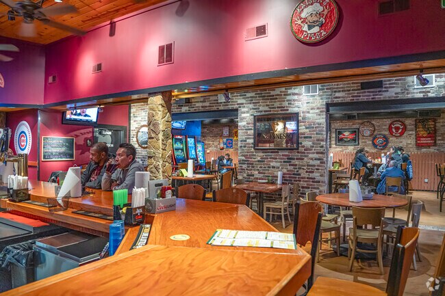 Hang out with friends and family while enjoying award winning pizza in Harbor Side.