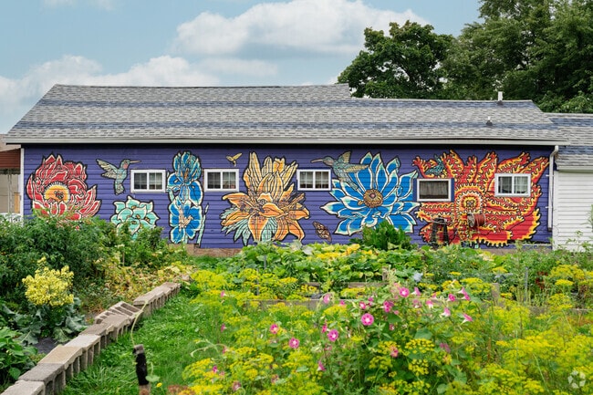 Urban garden in South Ellicott features public art and community plots.