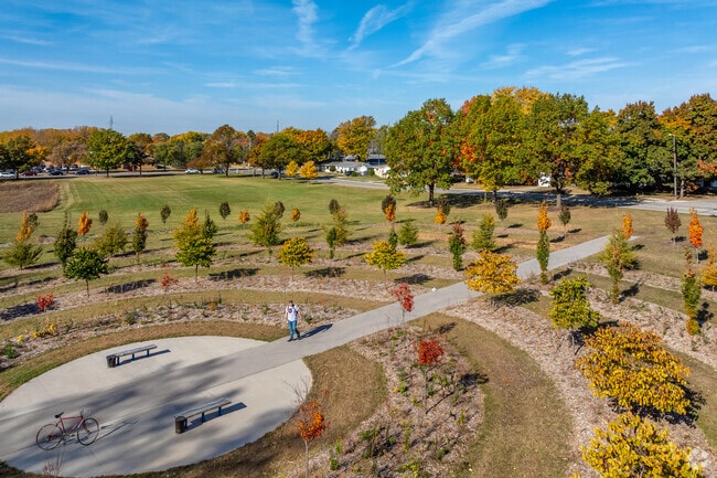 Tree-lined paths wind through Baird Creek Park’s scenic greenway.