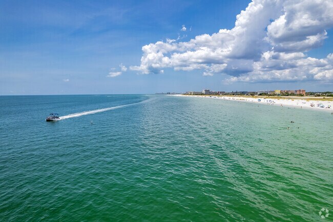 You can live where people vacation if you make Treasure Island, FL your new home near Seminole.