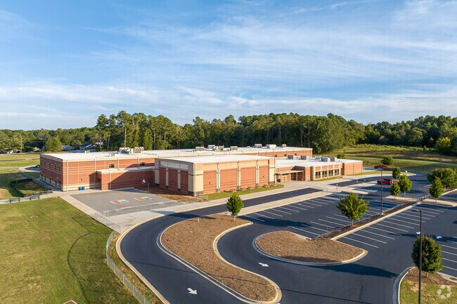The rear portion of the building is used for student drop off at Winder Elementary .