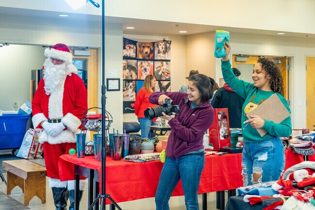 Visitors enjoy the Franklin County Dog Shelter Holiday Bazaar.