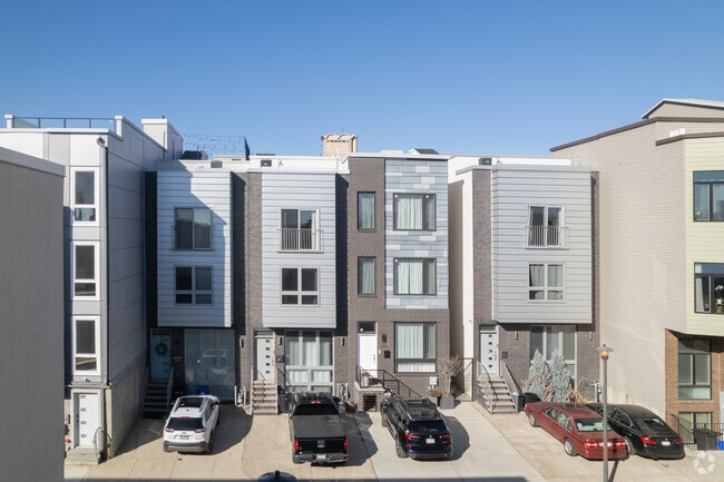 Residents of these North Marshall Street row homes offer owners off-street parking in Poplar.
