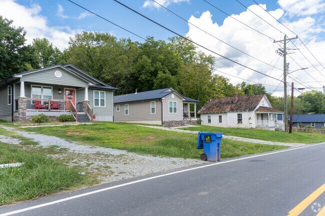 You can find a selection of smaller cottages with decent size yards in Woodlawn.