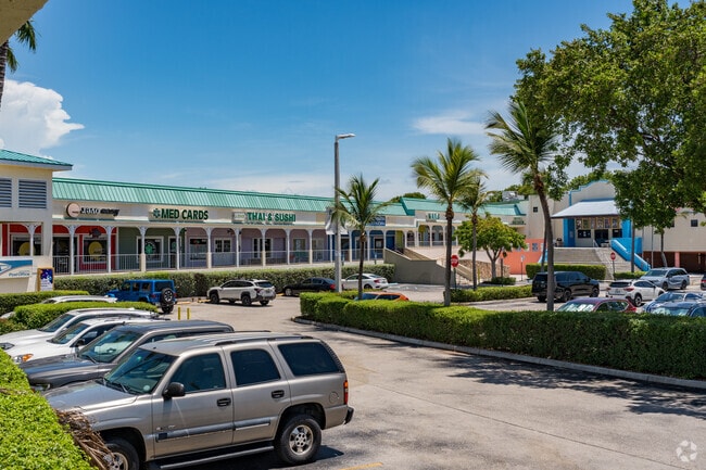 A movie theater and retail shops are found in Tavernir Towne Center .