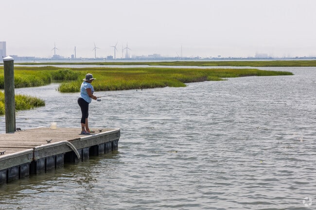 Fishing off the pier at Faunce Landing minutes from Mount Pleasant.