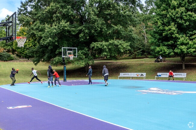 Catch a quick game of basketball at Latta Park Basketball Court in Dilworth, NC.