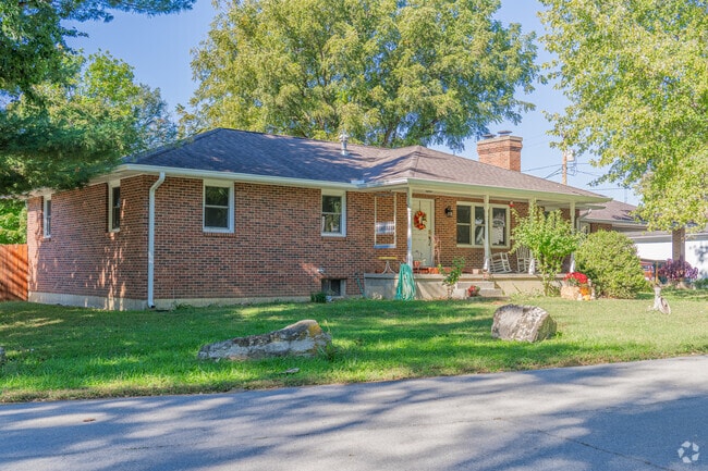 Brick ranch‑style homes appear on tree‑lined blocks in Fayette.