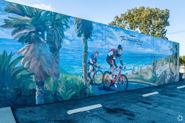 Wall art of the local lifestyle in Eastside Costa Mesa.