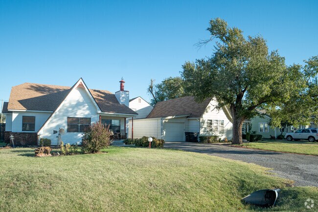 The quiet streets of Moore are a great place to take a walk and see beautiful Ranch homes such as this.