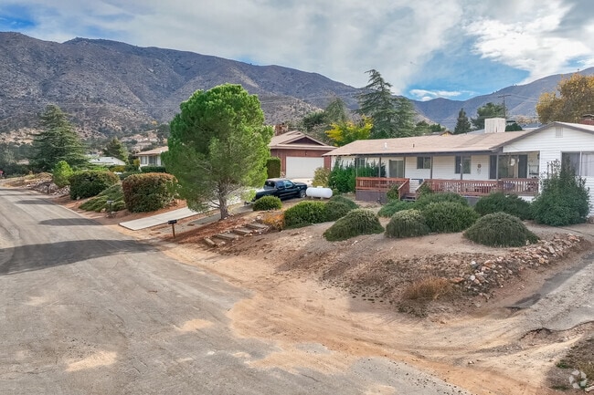 Rows of elevated homes in the hills of Squirrel Mountain Valley.