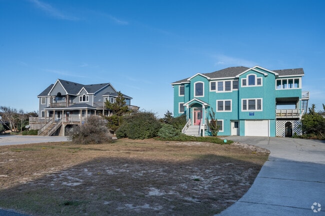 Many of the homes in Corolla have large yards as well as direct beach access.