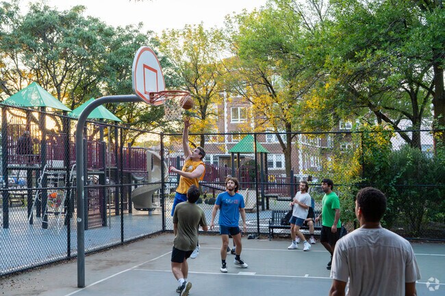 Teammates look up as this player scores the game-winning point at Kenney Park in Davis Square.