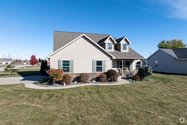Spacious front yards in Freeland give kids space to play.