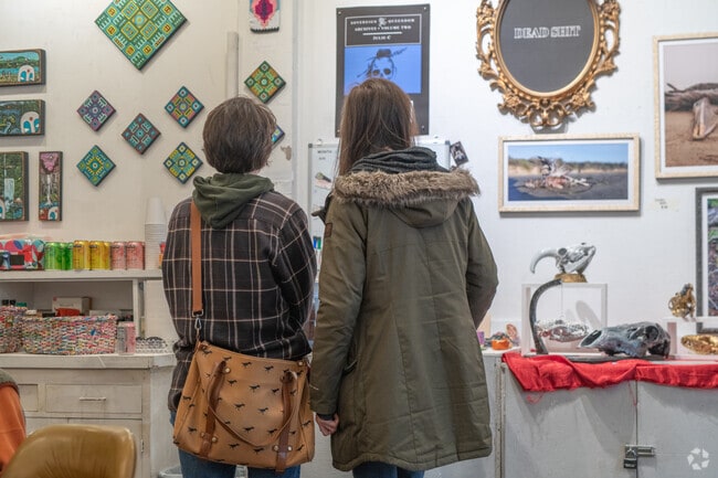 Take a friend to Capitol Hill Art-Walk to see local artworks.