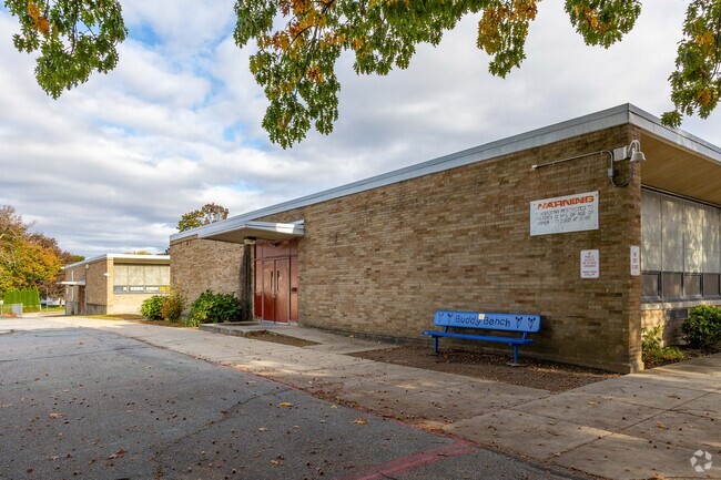 Stadium Elementary School has a buddy bench and multiple entrances in Cranston.