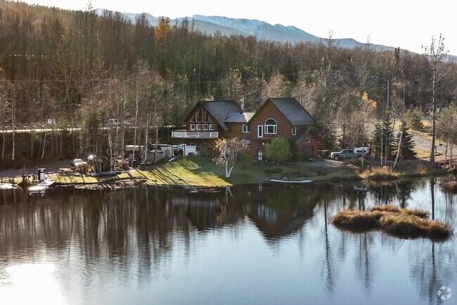 Spacious homes and wooded waterfront lots line Lower Fire Lake in Eagle River.