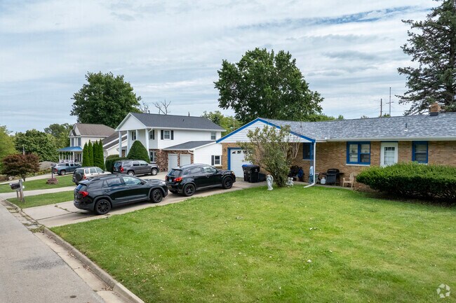 Irvin Park offers an array of homes with spacious lots, large driveways, and garages.