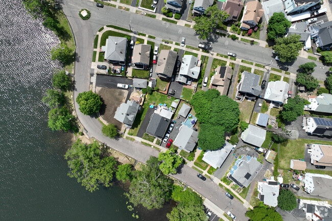Lynn's homes curve around the landscape of Flax Pond.