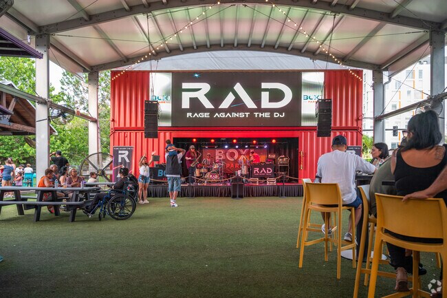 Meridan Parks residents move to the rhythm of live music at Boxi Park.