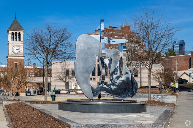 Charlie Loudermilk Park has beautiful art-crafted fixtures around Buckhead Forest.