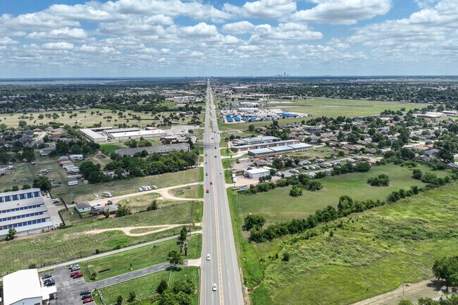 Northwest Expressway cuts through the center of Harvest Hills West, leading toward downtown OKC.