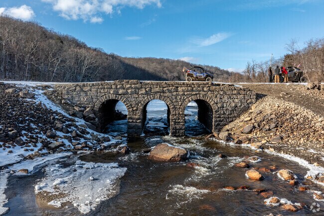 The Ghost Bridge in Oak Ridge emerged from the drained reservoir, revealing a century-old hidden structure.