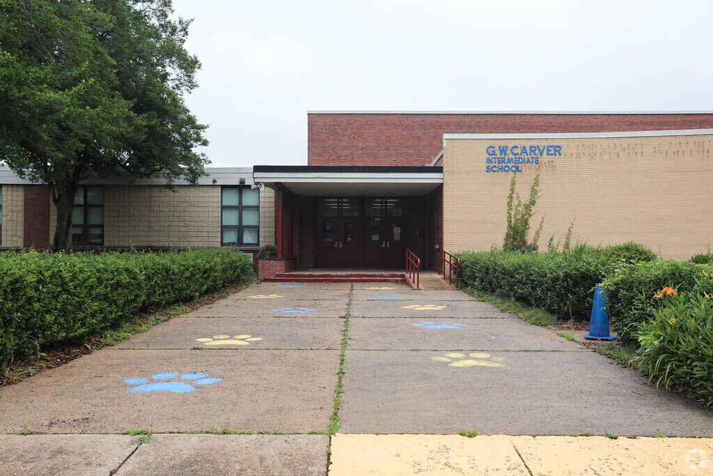 George W Carver Intermediate School has paw prints at the front entrance.