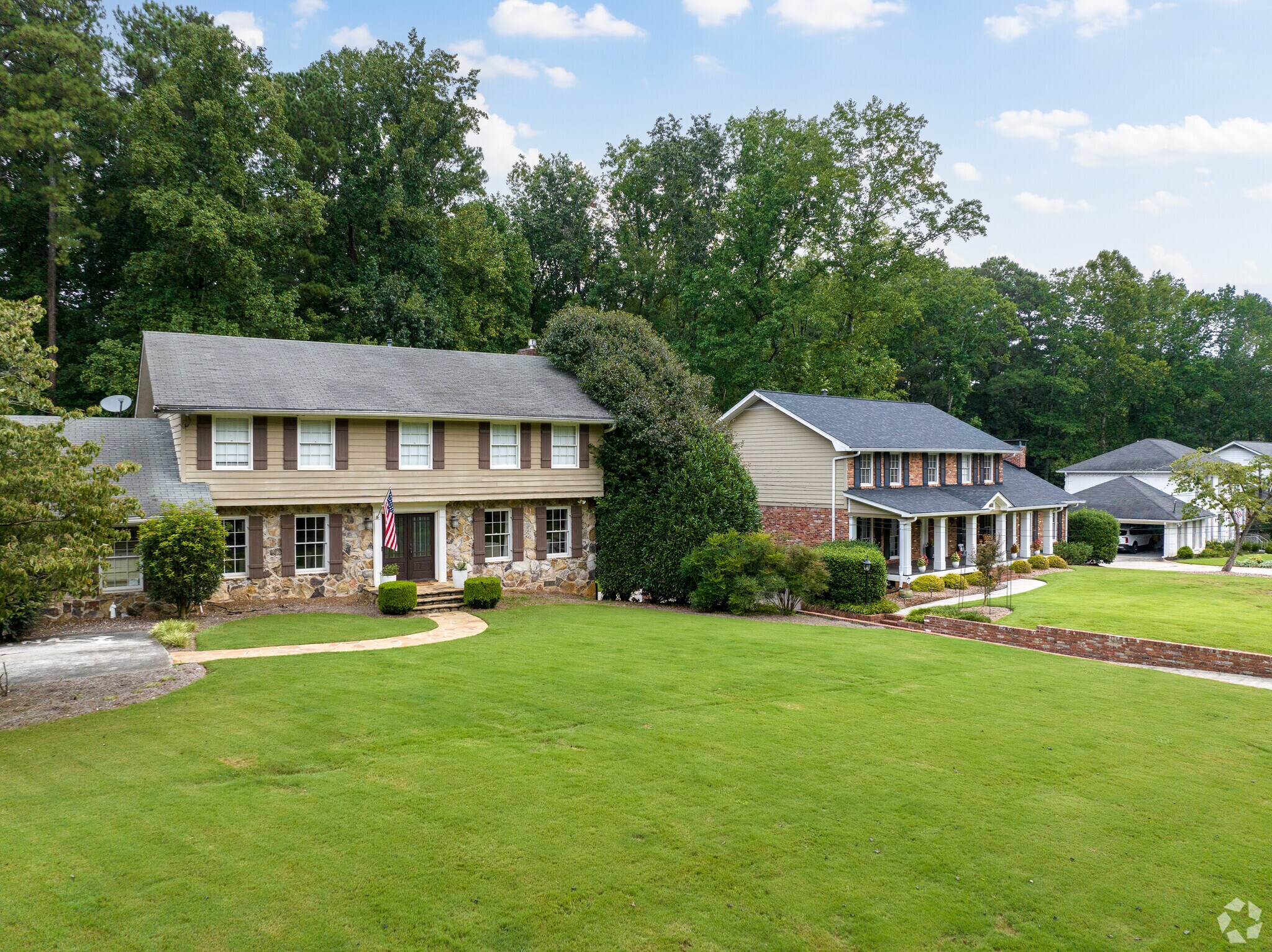 Homes boast wonderful green lawns in the Dunwoody Panhandle neighborhood.