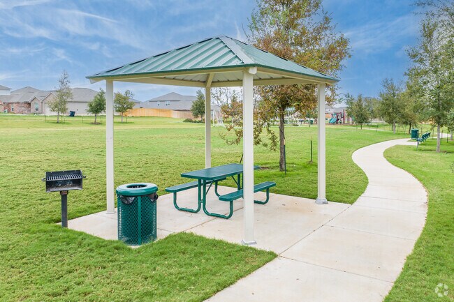 Paved trails meander through communities, surrounded by nature in Jarrell.