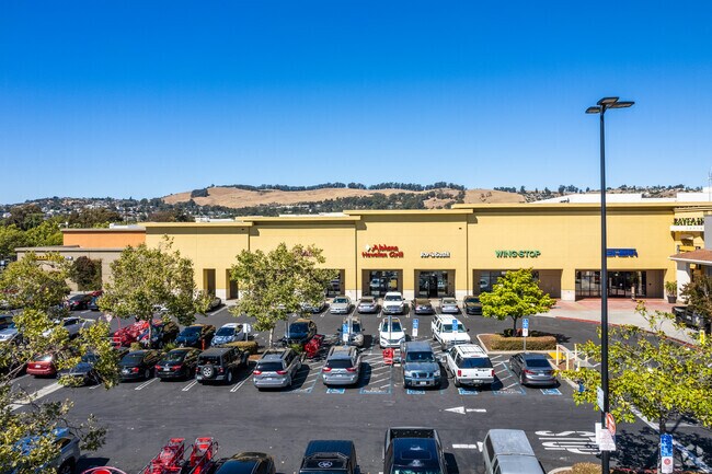 Enjoy a scenic view of the vibrant shops nestled within Ashland's Bayfair Center.