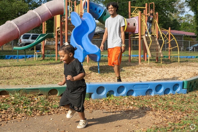 Near Riley, you will find Midfield Park, where children can play and have fun.